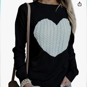 Black with white heart knitted sweater. Size small.